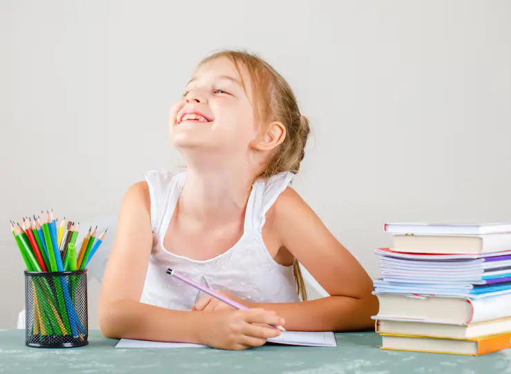 Confident young student learning phonics online